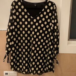 Black tunic with gold metallic dots.